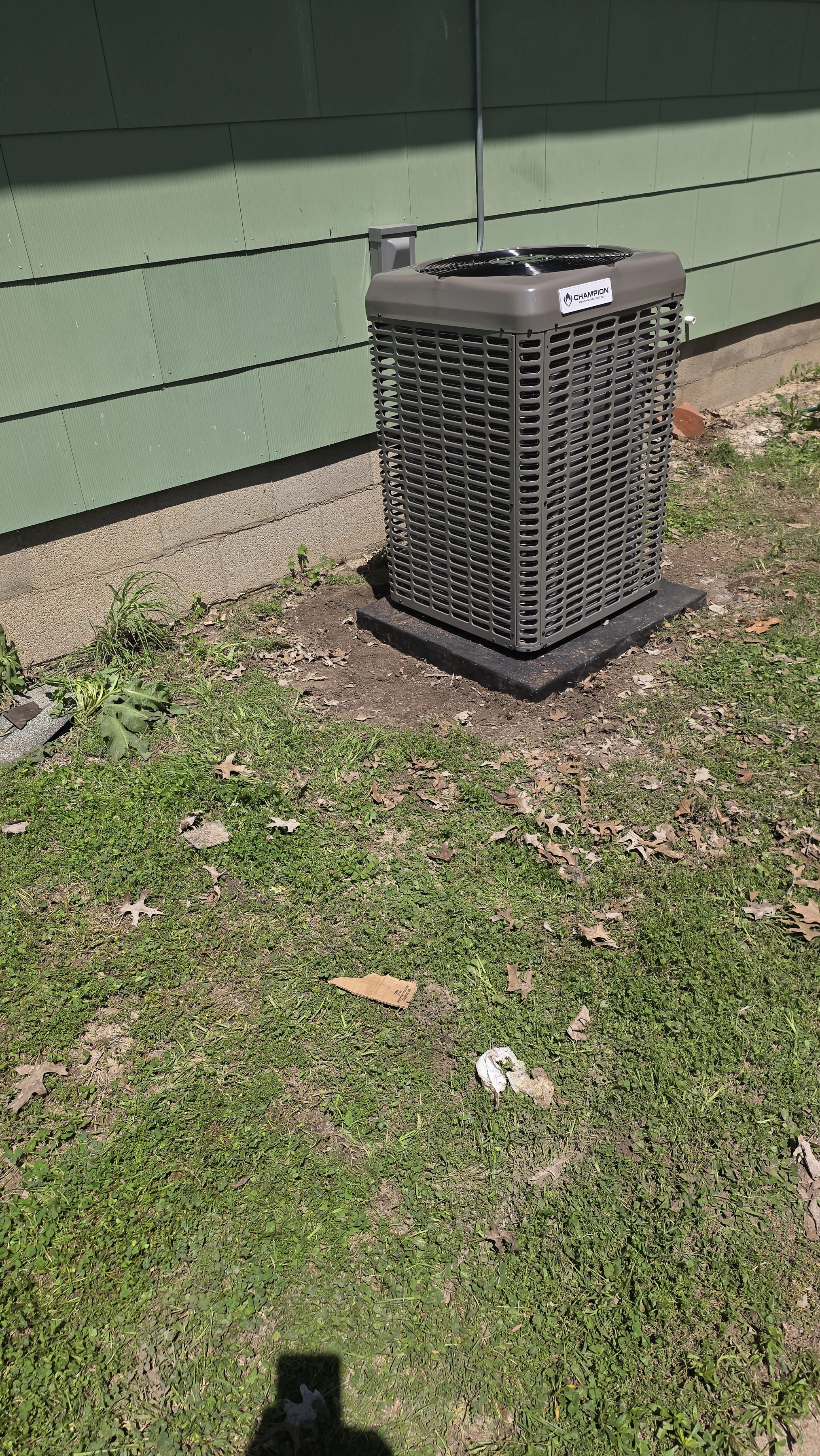 Outdoor AC equipment beside a home